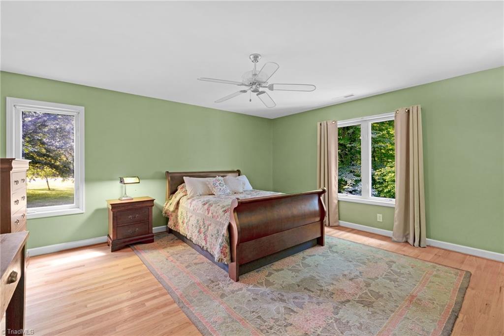 1134 Edwards Farm Road King, NC 27021 - Photo 16 of 50 Main Level primary with 2 walk in closets and ensuite bath