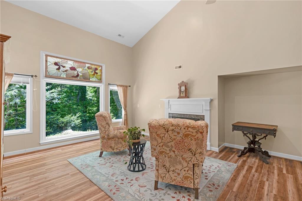 1134 Edwards Farm Road King, NC 27021 - Photo 20 of 50 Main level overlooks this lovely den with extraordinary space for entertaining, and the lower level guests rooms.