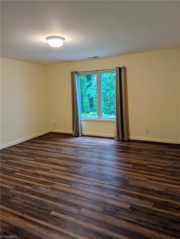1134 Edwards Farm Road King, NC 27021 - Photo 27 of 50 This room is additional guest space or office with double closets noted as a 3rd bedroom on the tax card when the home was built. Septic is 2 bedroom system but could be expanded if needed with updated permitting and approval of Stokes County.
