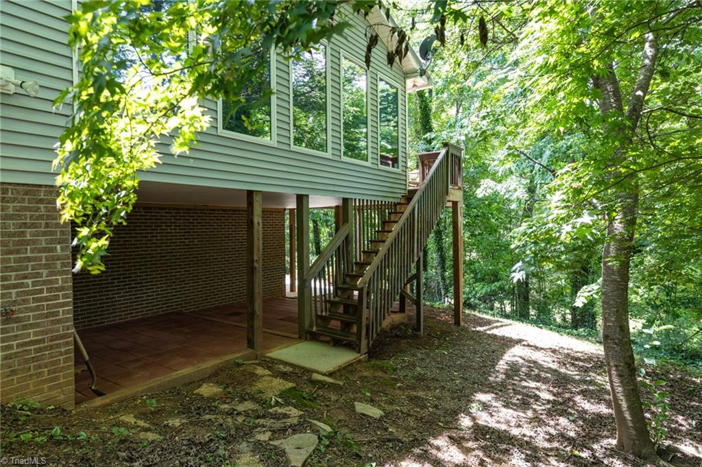 1134 Edwards Farm Road King, NC 27021 - Photo 29 of 50 Lower level back yard with wrap around patio