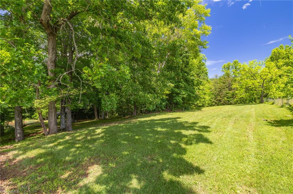 1134 Edwards Farm Road King, NC 27021 - Photo 39 of 50 Just off the barn a nice fenced pasture for hobby farming