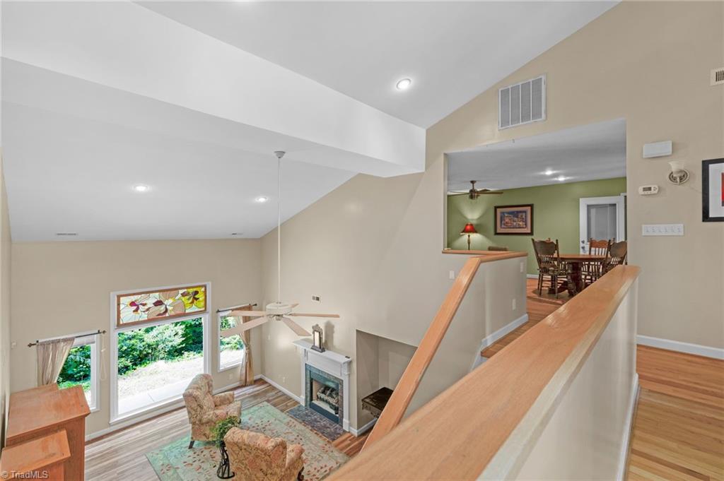 1134 Edwards Farm Road King, NC 27021 - Photo 6 of 50 Designed to bring the outside in with an artistic flair throughout, each room offers sun drenched interiors with fabulous views of surrounding nature.