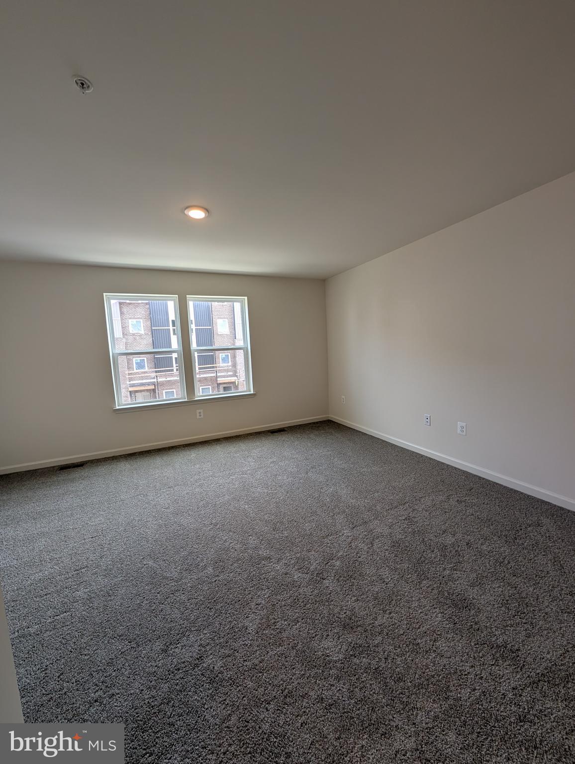 9985 A Justify Run Laurel, MD 20723 - Photo 15 of 33 a view of an empty room with a window