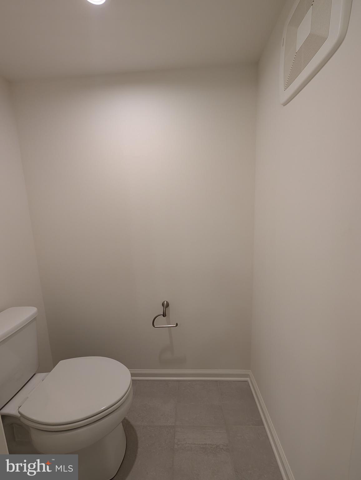 9985 A Justify Run Laurel, MD 20723 - Photo 19 of 33 a bathroom with a toilet and a shower