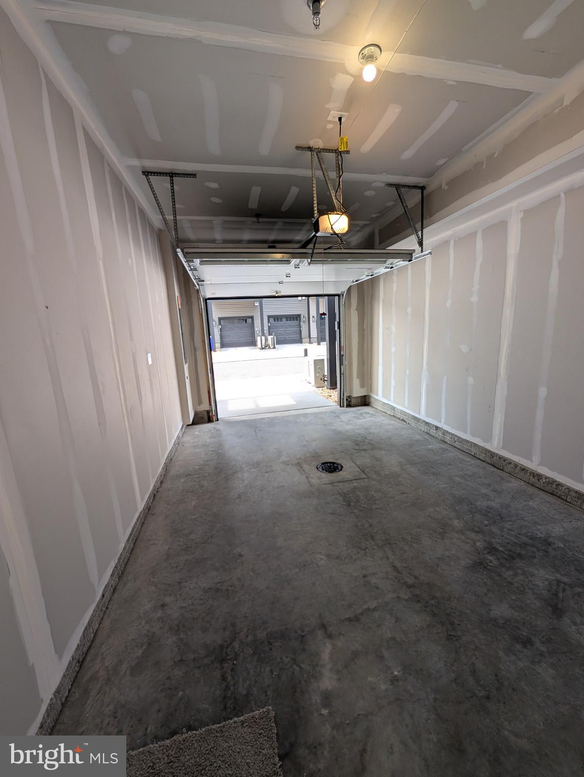 9985 A Justify Run Laurel, MD 20723 - Photo 24 of 33 a view of a hallway with a kitchen