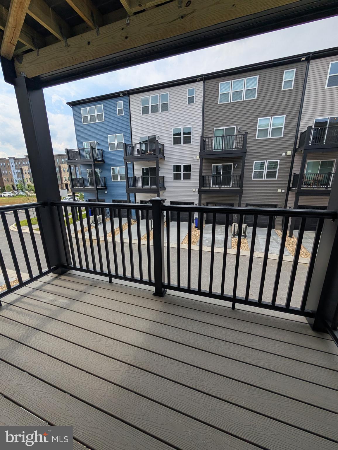 9985 A Justify Run Laurel, MD 20723 - Photo 9 of 33 a view of wooden balcony