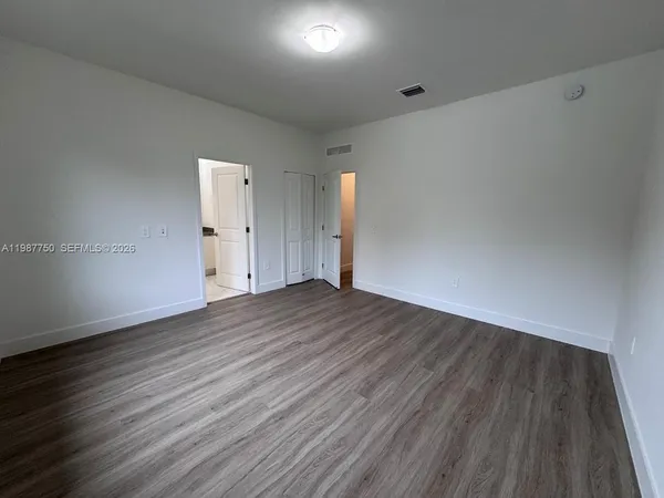a view of a room with racks on the wall