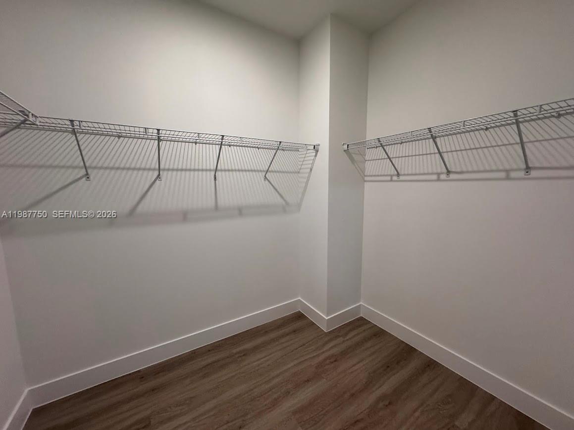 34435 Southwest 189th Court Homestead, FL 33030 - Photo 17 of 28 a view of a room with racks on the wall