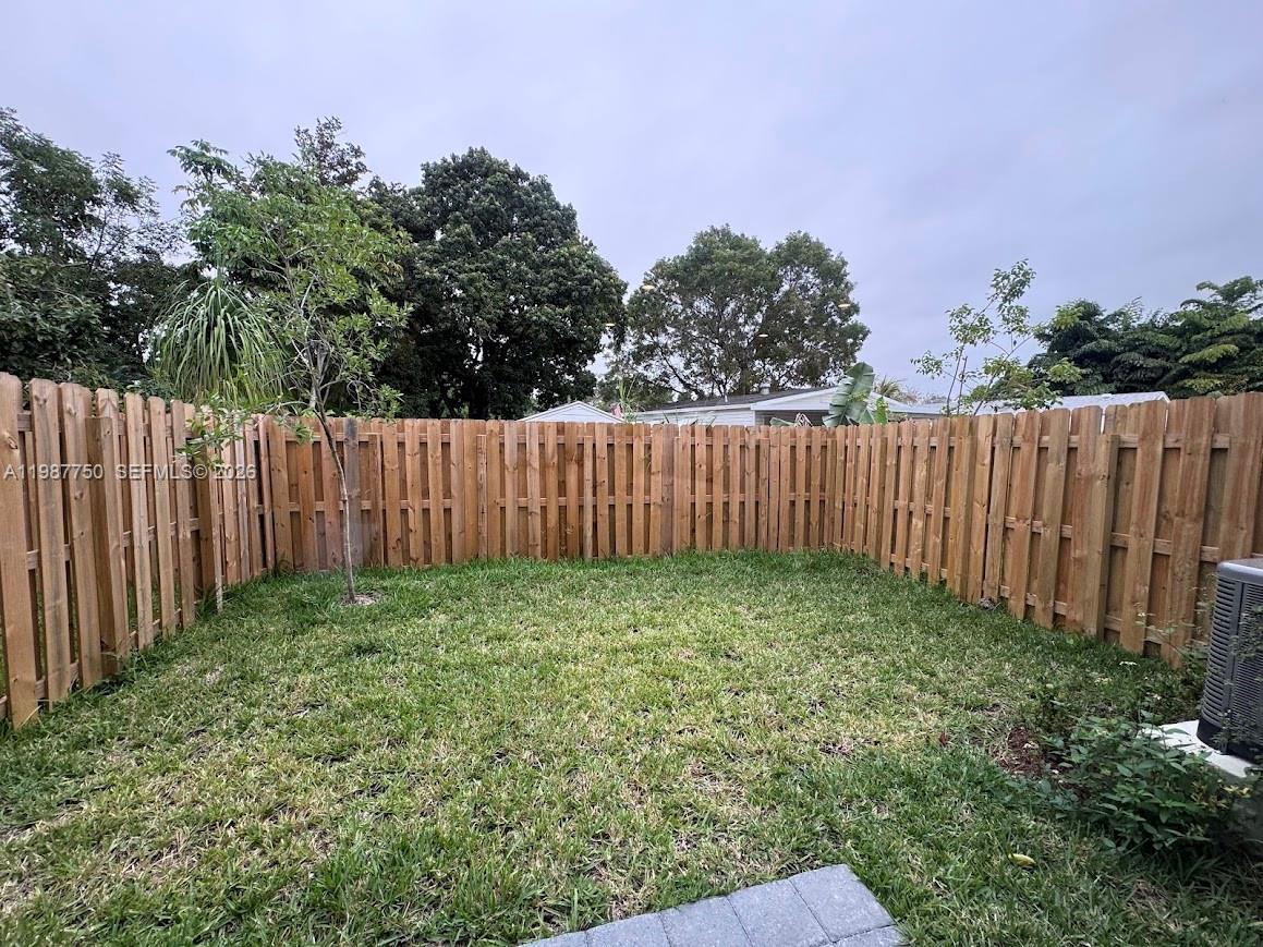 34435 Southwest 189th Court Homestead, FL 33030 - Photo 20 of 28 a green field with trees in the background
