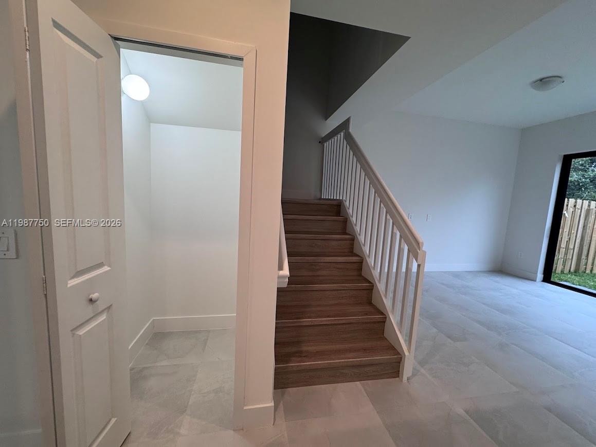 34435 Southwest 189th Court Homestead, FL 33030 - Photo 23 of 28 a view of entryway and hall with wooden floor