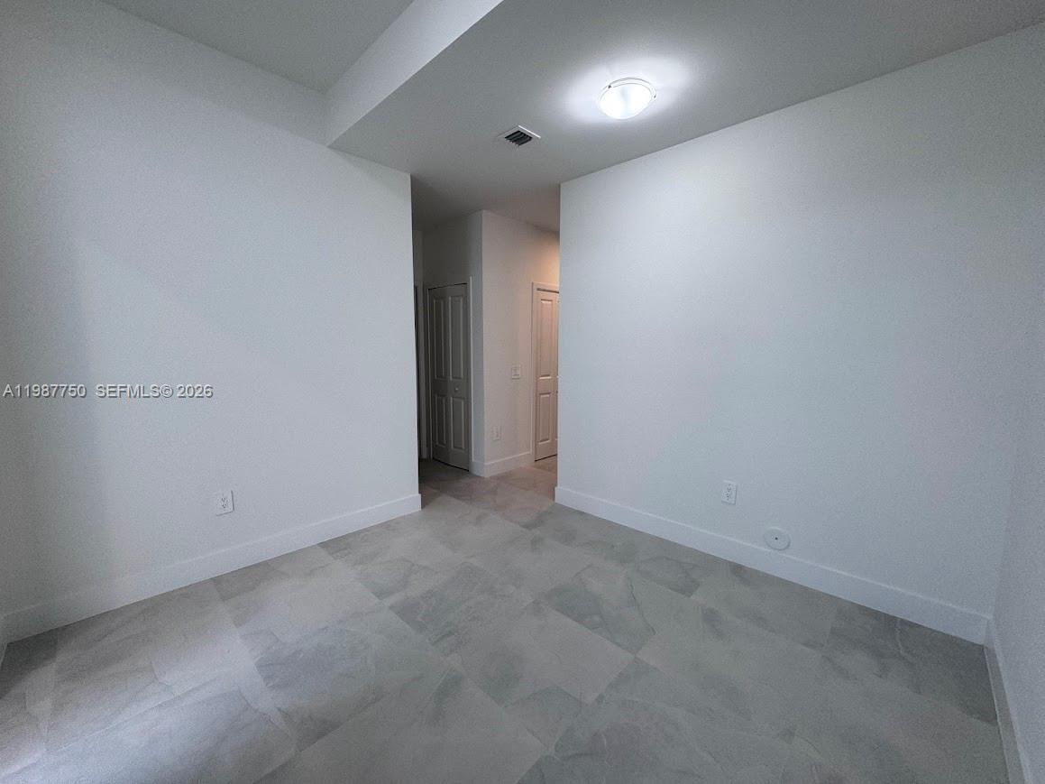 34435 Southwest 189th Court Homestead, FL 33030 - Photo 25 of 28 a view of an empty room