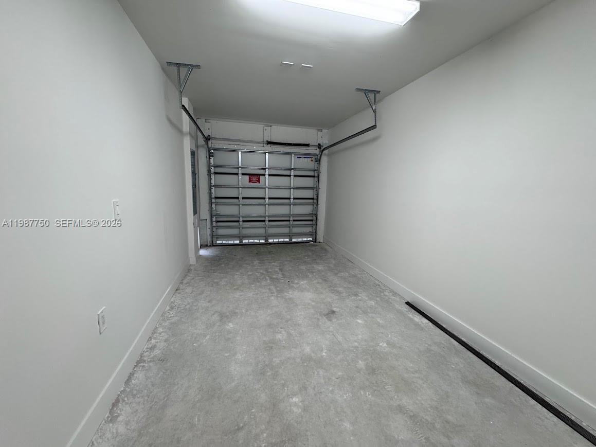 34435 Southwest 189th Court Homestead, FL 33030 - Photo 28 of 28 a view of room with stairs and a closet