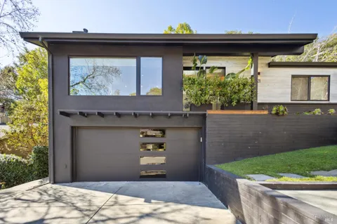 a view of a wooden door of the house