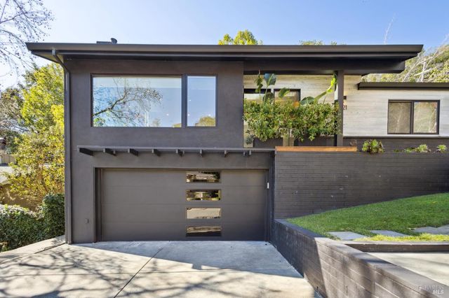 a view of a wooden door of the house