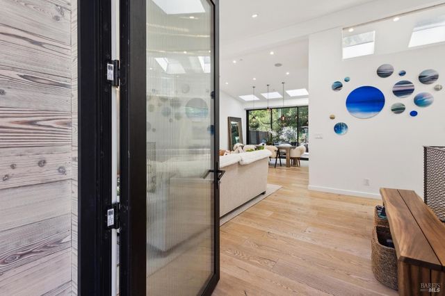 a view of a living room with a large window
