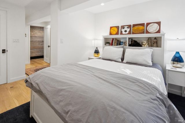 a white toilet sitting next to a bathroom sink
