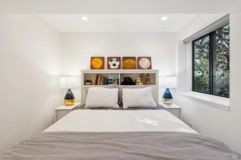 a living room with large windows