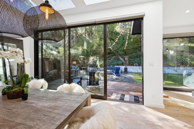 a view of a chairs and tables in patio