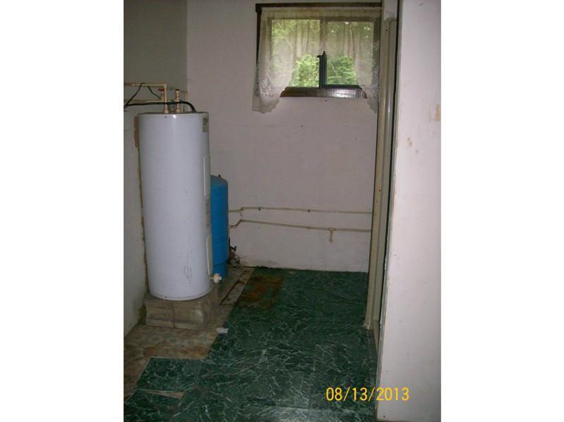 21 Rainbow Lane Roxbury, ME 04275 - Photo 6 of 8 Bathroom. Bathroom, Water heater