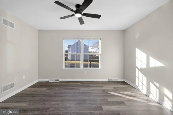 a bathroom with a toilet sink toilet and shower