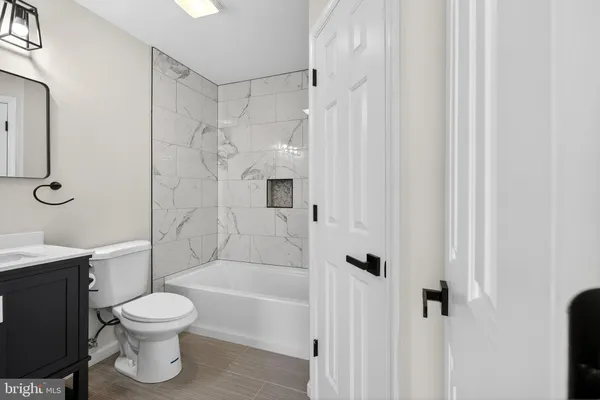 a bathroom with a bathtub