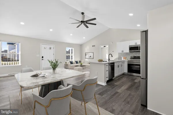 a view of a dining room with furniture