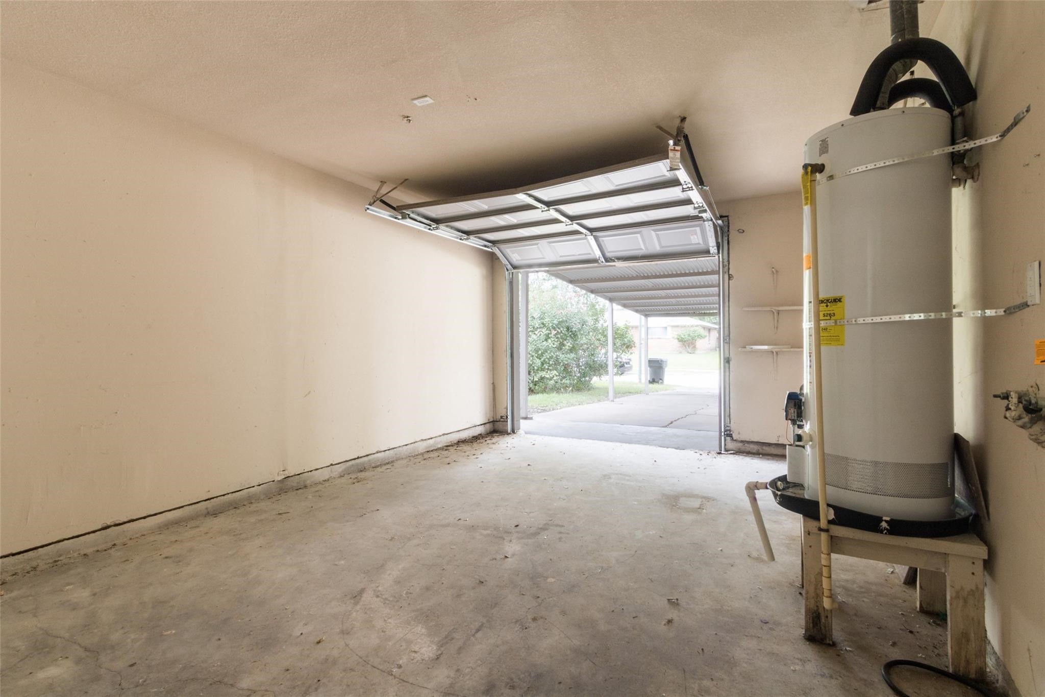 3823 Heatherbrook Drive Houston, TX 77045 - Photo 5 of 11 a view of a room with gym equipment
