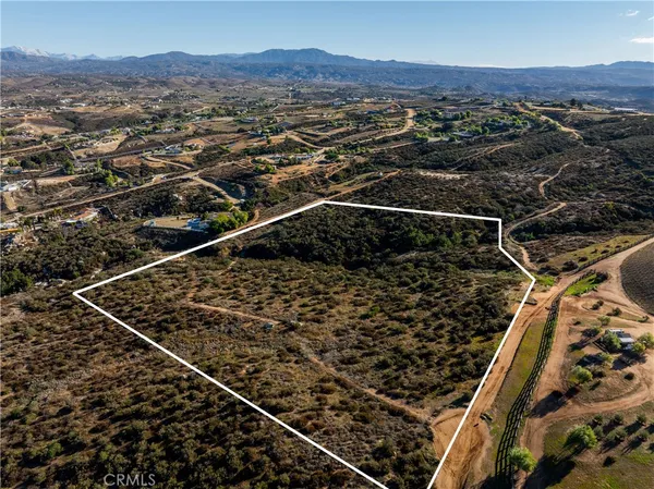 a view of an ocean and mountain