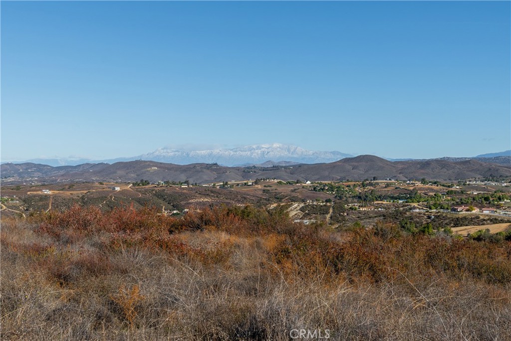 0 Vía Quito Temecula, CA 92592 - Photo 3 of 19 a view of a mountain range with trees