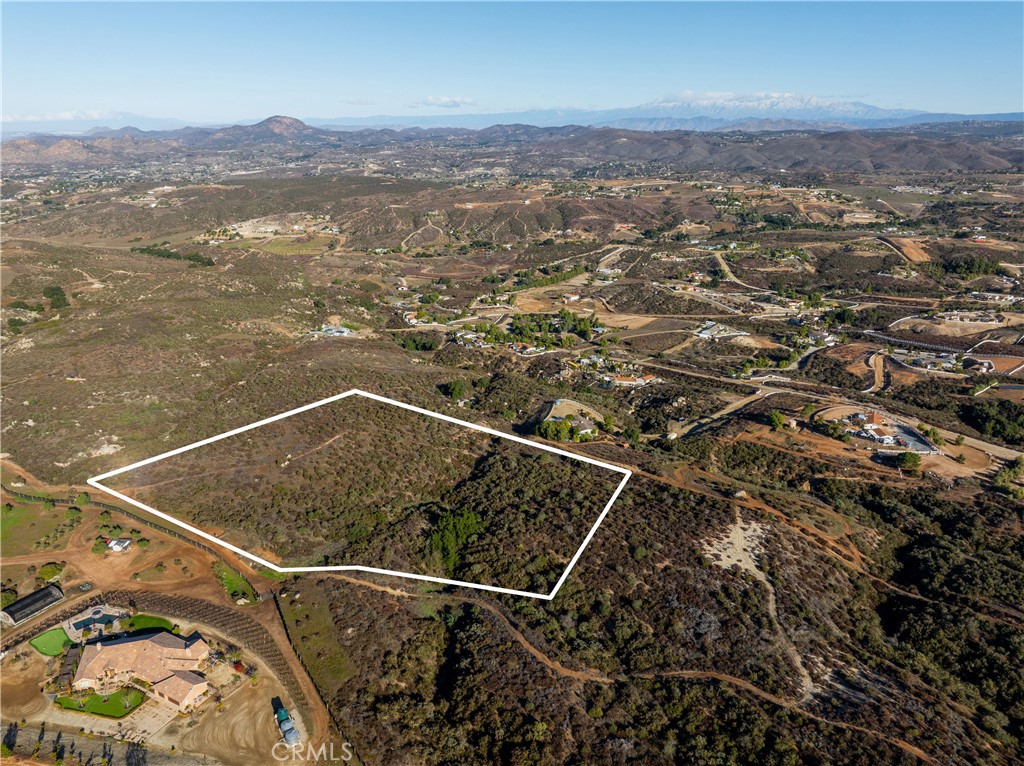 0 Vía Quito Temecula, CA 92592 - Photo 9 of 19 an aerial view of residential houses with outdoor space