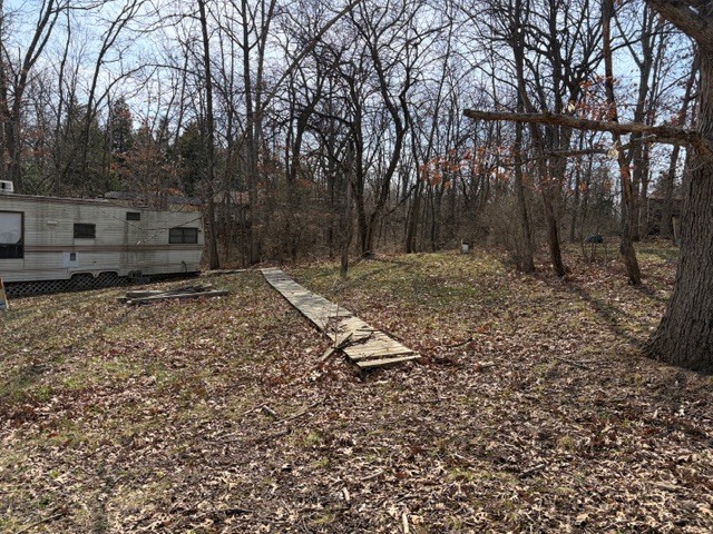 2795 East 28th Road Marseilles, IL 61341 - Photo 3 of 42 a view of a backyard with large trees