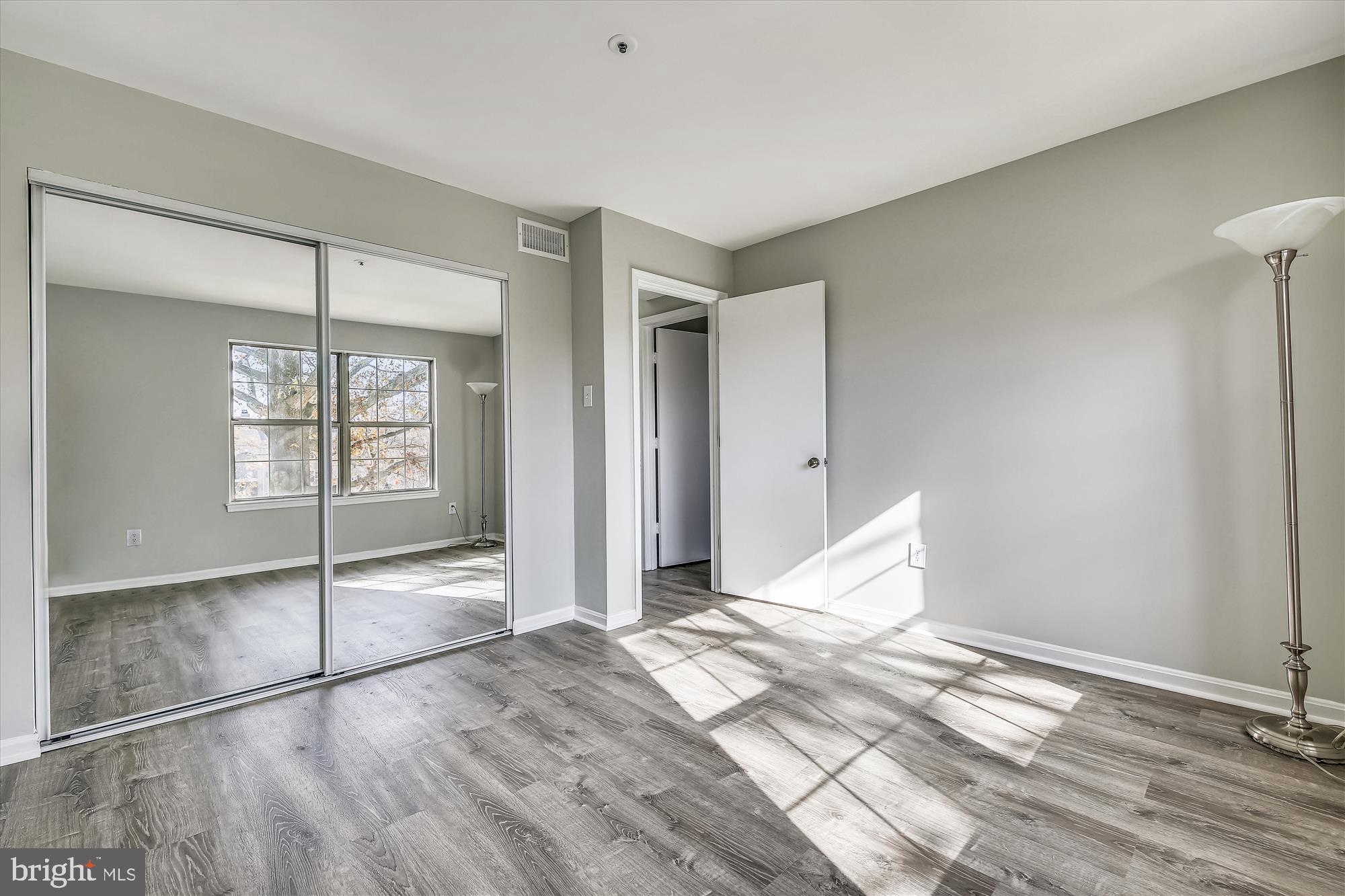 14902 McKisson Court, Unit 8BE Silver Spring, MD 20906 - Photo 21 of 38 Sun-Filled Bedroom