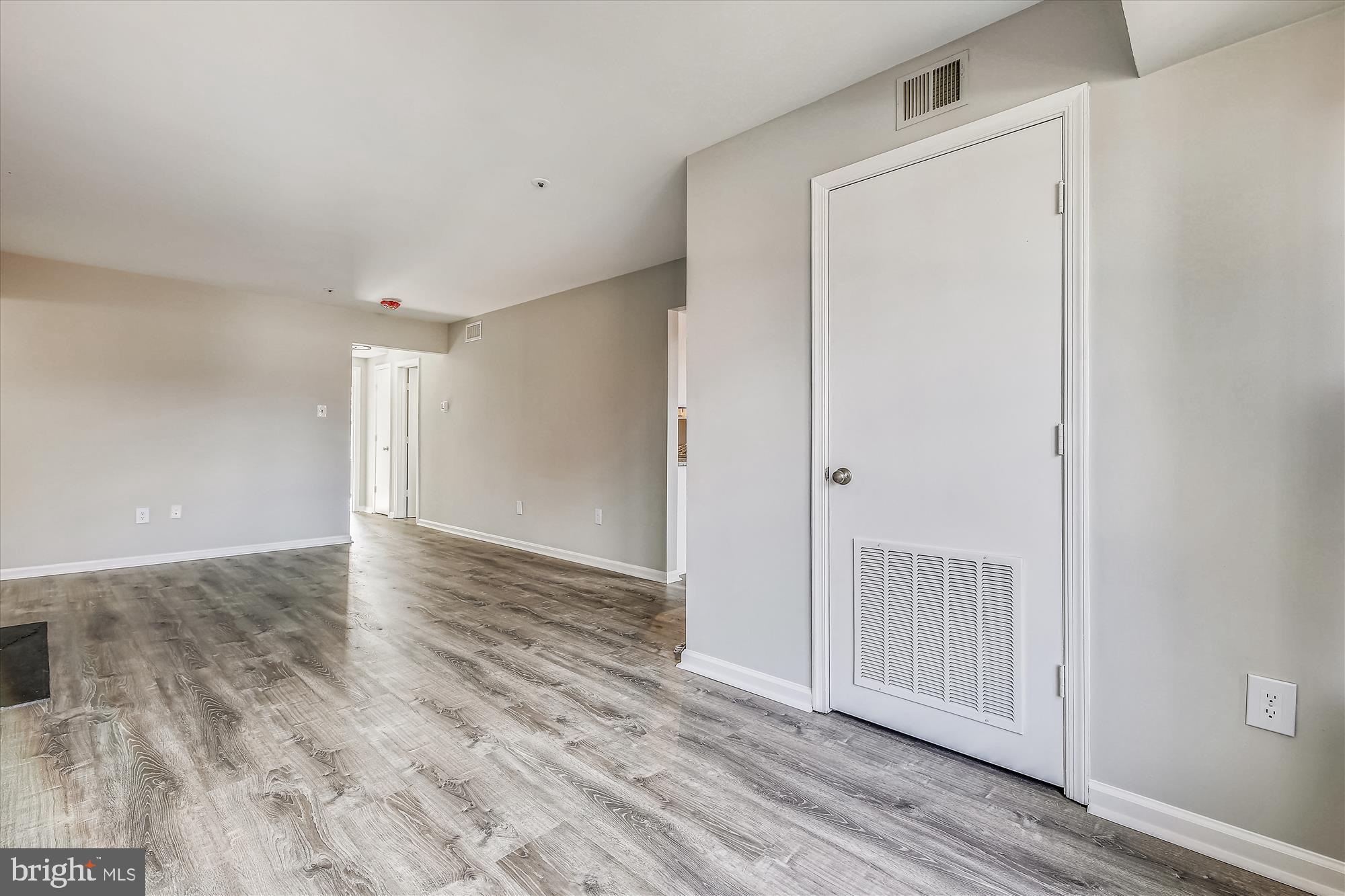 14902 McKisson Court, Unit 8BE Silver Spring, MD 20906 - Photo 7 of 38 Dining and Living Room - Fresh Paint, New Floors