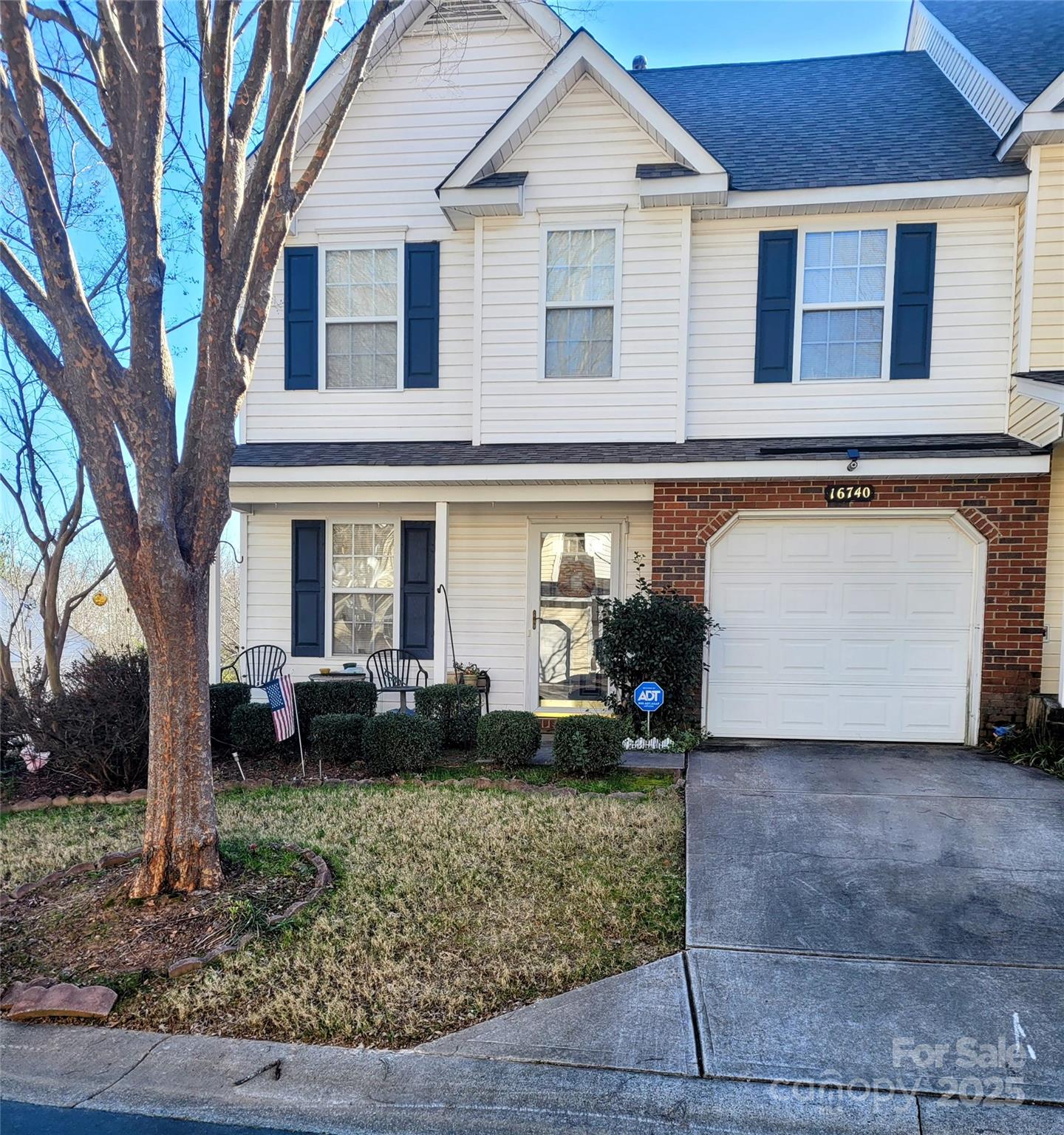 16740 Timber Crossing Road Charlotte, NC 28213 - Photo 1 of 7 a front view of a house with garden