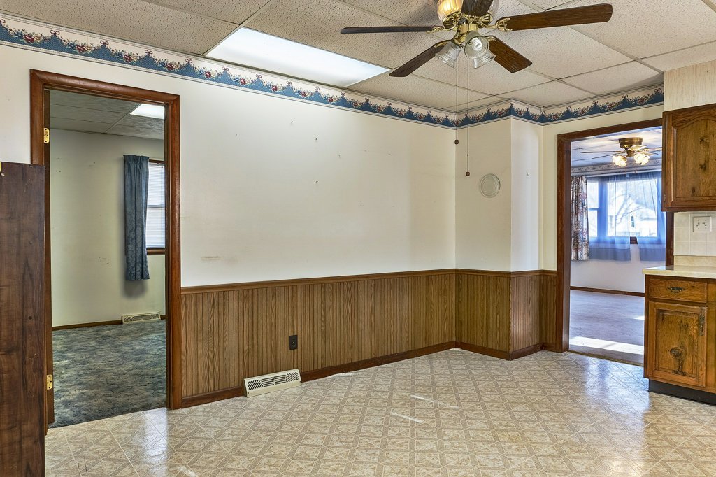 114 South Madison Street Saybrook, IL 61770 - Photo 11 of 31 a view of a room with wooden floor and windows