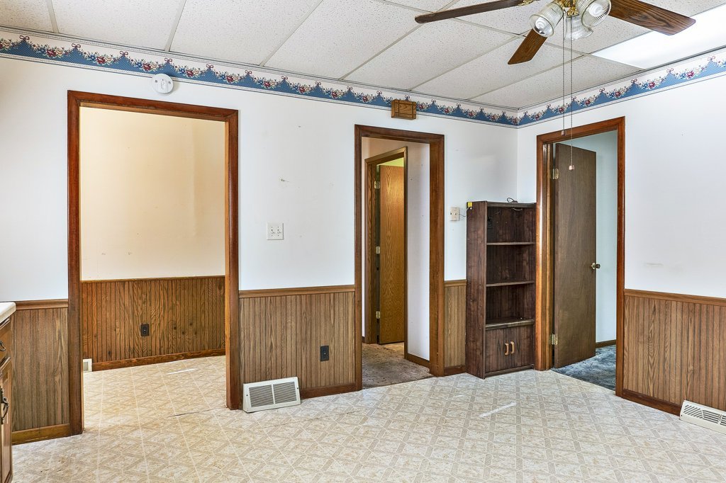 114 South Madison Street Saybrook, IL 61770 - Photo 12 of 31 a view of a hallway with wooden shelves