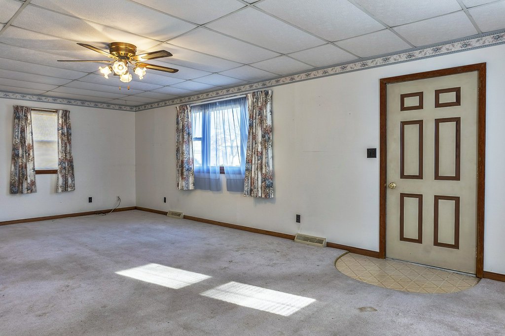114 South Madison Street Saybrook, IL 61770 - Photo 13 of 31 a view of an empty room with a window