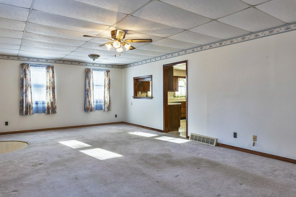 114 South Madison Street Saybrook, IL 61770 - Photo 15 of 31 an empty room with windows and fan