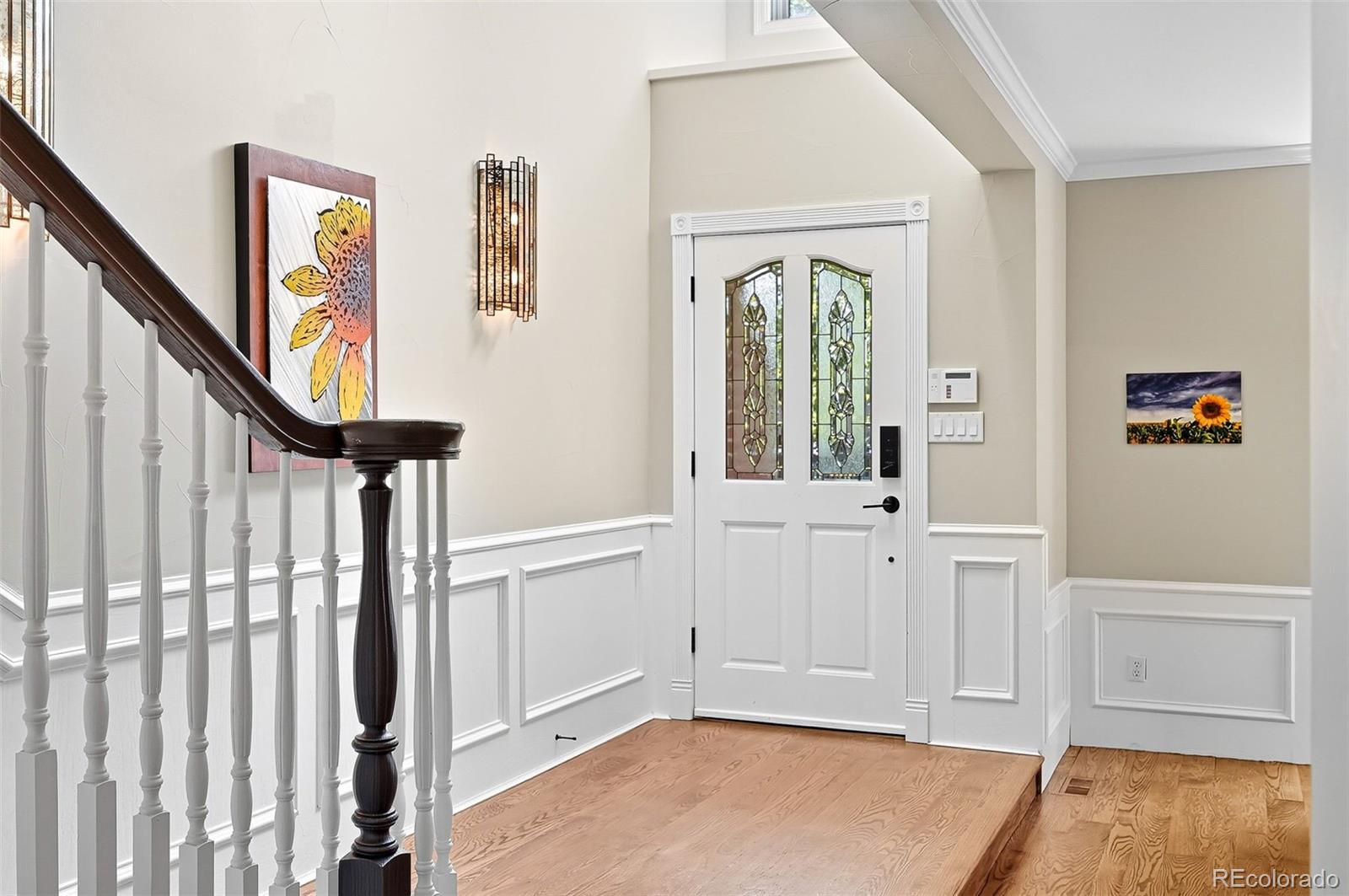 358 Steele Street Denver, CO 80206 - Photo 14 of 48 a view of an entryway with wooden floor