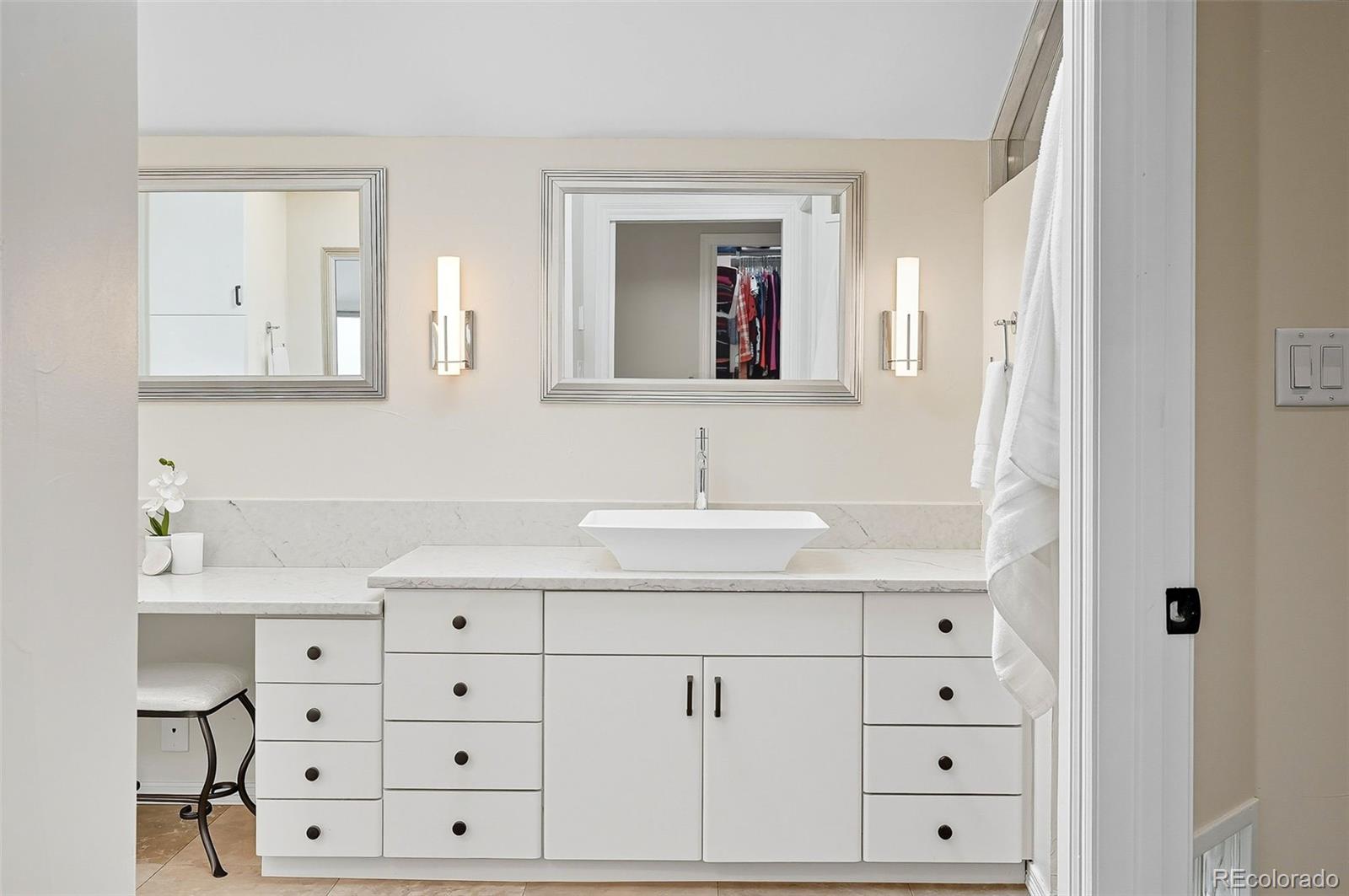 358 Steele Street Denver, CO 80206 - Photo 31 of 48 a bathroom with a sink vanity and mirror