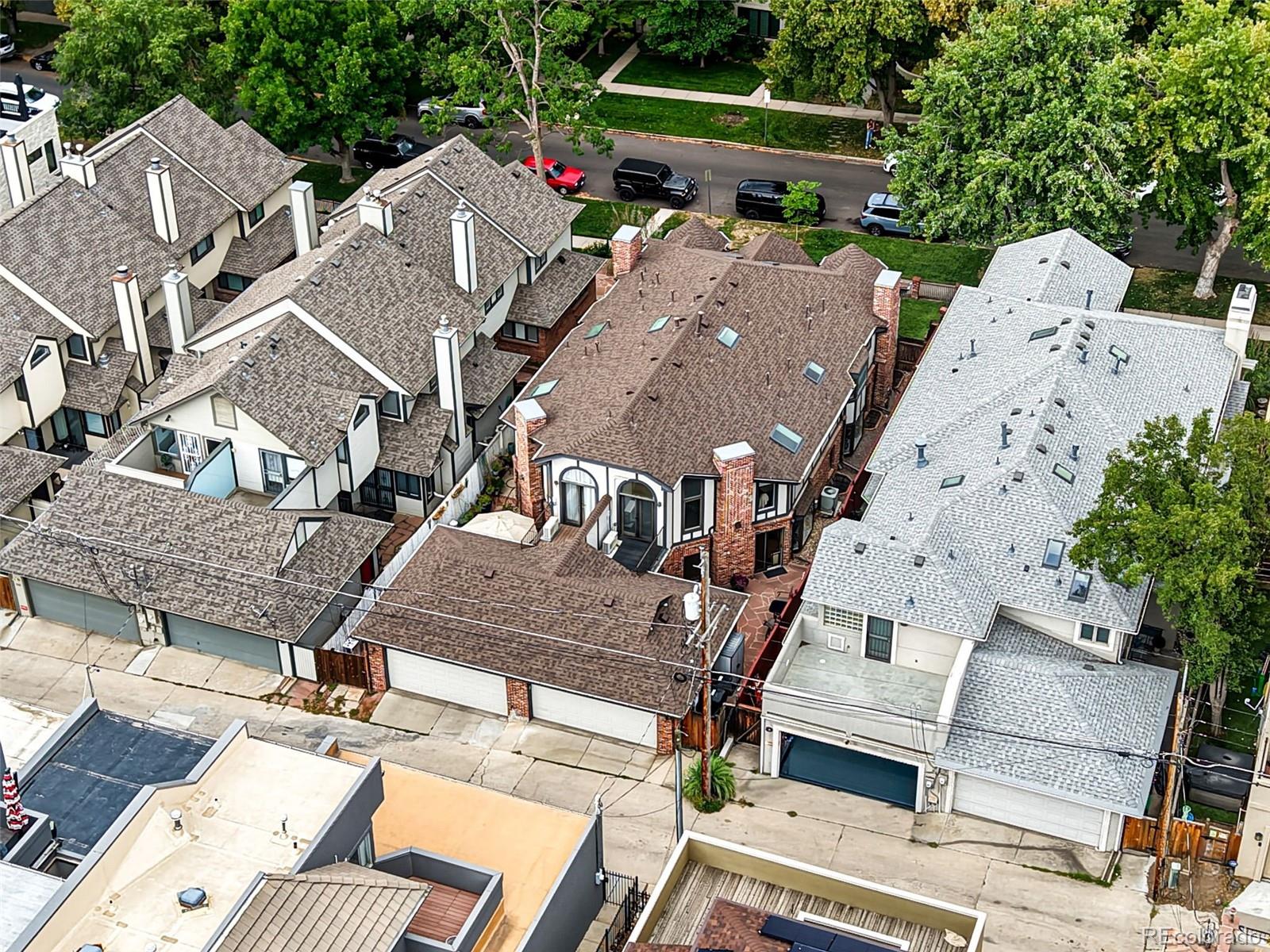 358 Steele Street Denver, CO 80206 - Photo 46 of 48 an aerial view of residential houses with outdoor space