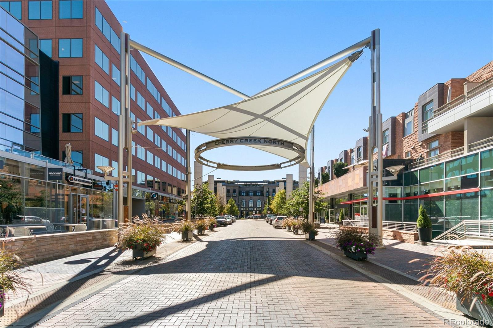 358 Steele Street Denver, CO 80206 - Photo 48 of 48 a view of a building with a street