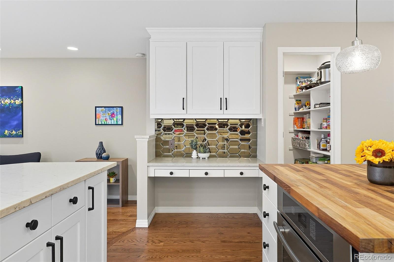358 Steele Street Denver, CO 80206 - Photo 8 of 48 a view of kitchen with cabinets and wooden floor