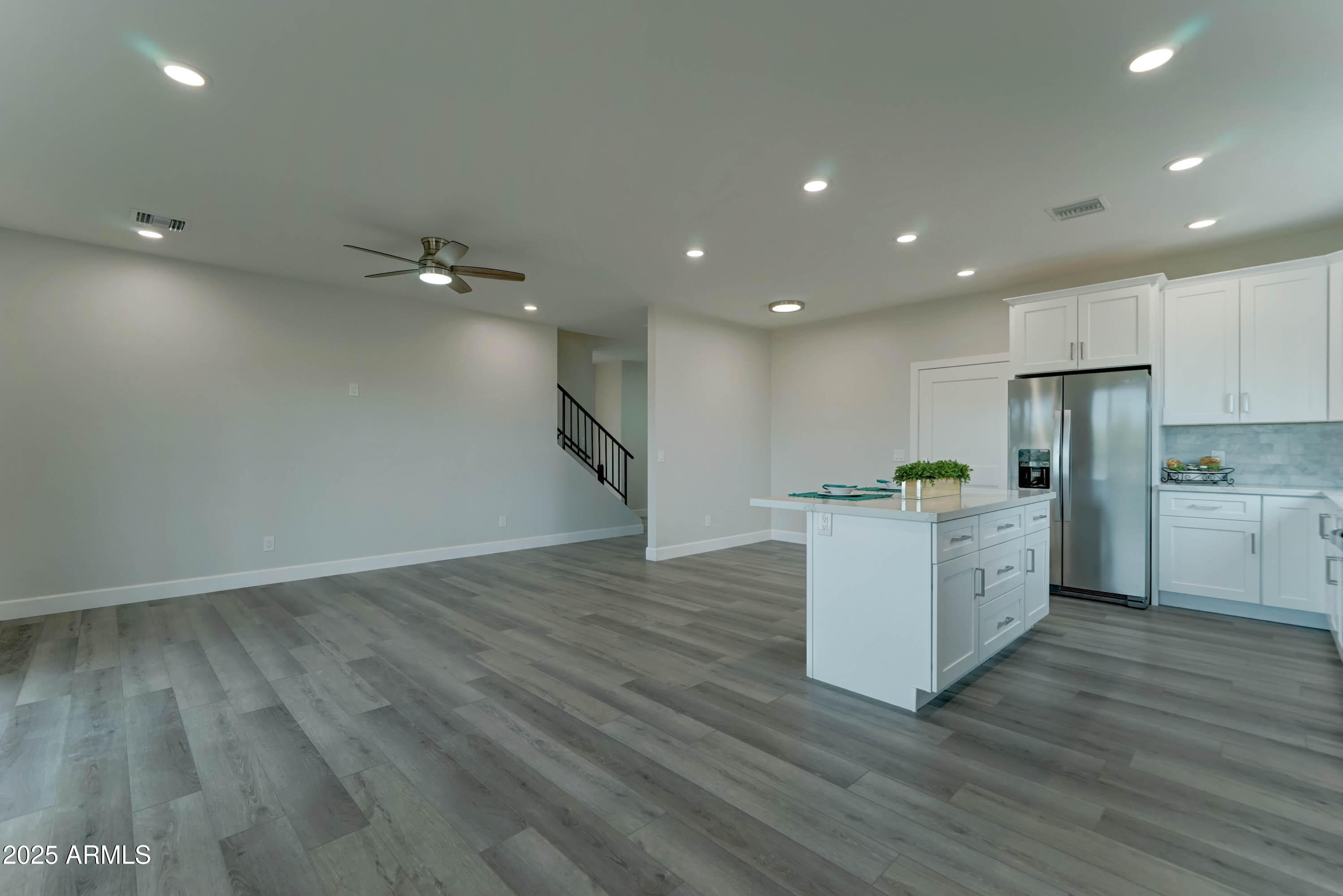 4294 North Wolverine Pass Road Apache Junction, AZ 85119 - Photo 13 of 37 a view of kitchen with cabinets and wooden floor