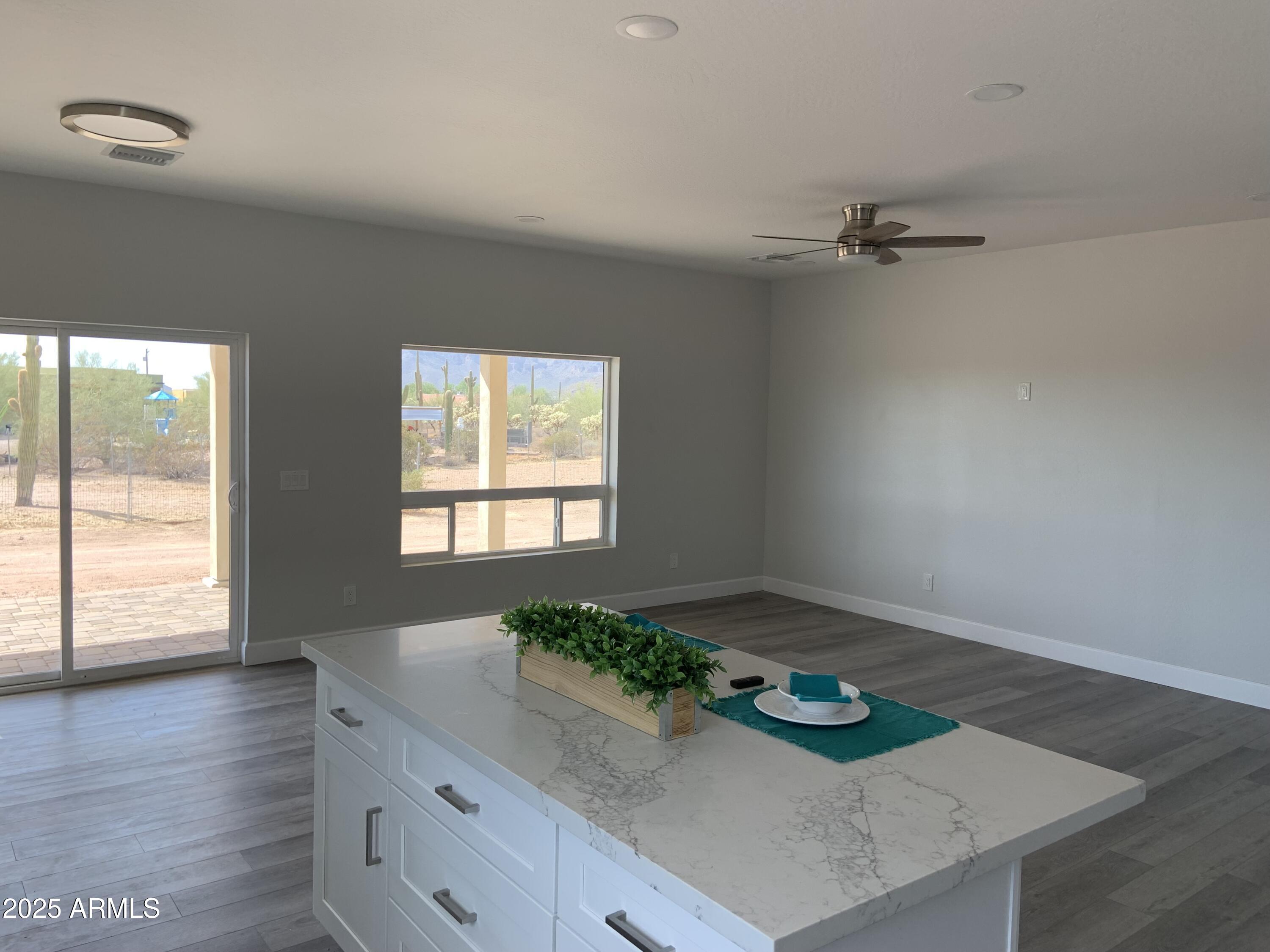 4294 North Wolverine Pass Road Apache Junction, AZ 85119 - Photo 10 of 37 an entryway with wooden floor and window