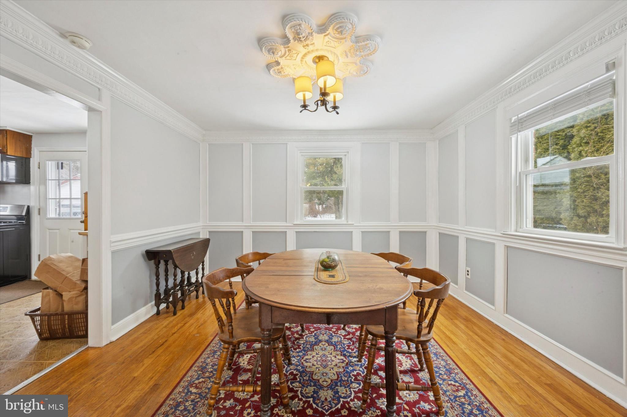 933 Greenbriar Lane Springfield, PA 19064 - Photo 5 of 20 a dining room with furniture and window