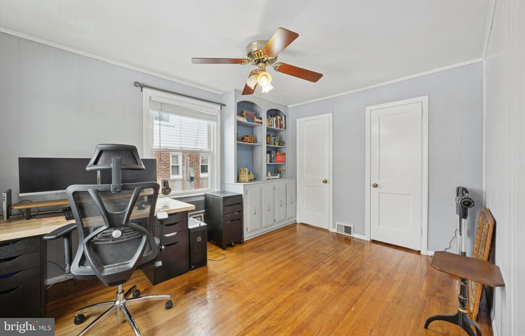 933 Greenbriar Lane Springfield, PA 19064 - Photo 8 of 20 a view of a workspace with furniture and a window