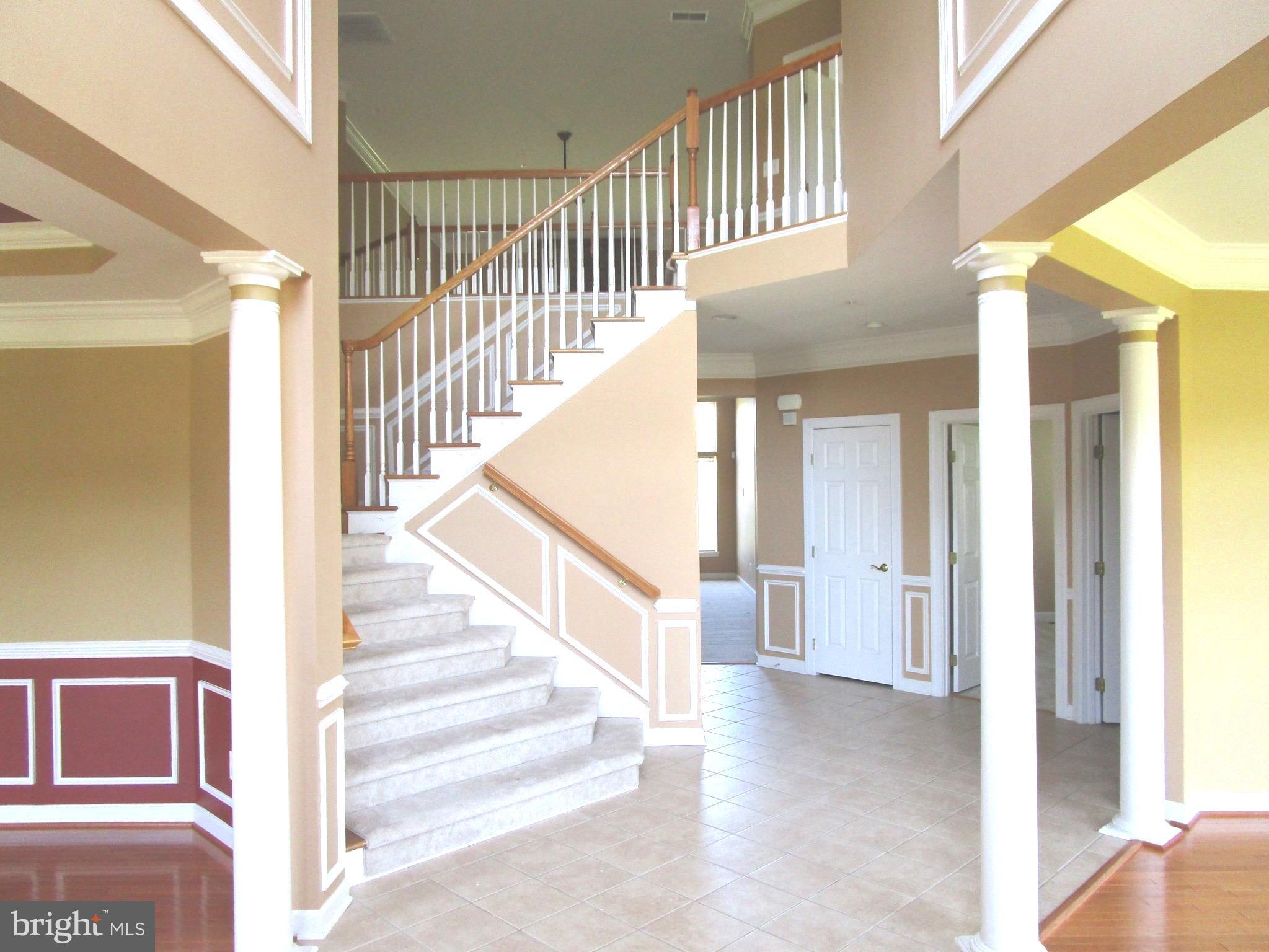 14204 Derby Ridge Road Bowie, MD 20721 - Photo 2 of 27 a view of entryway and hall with wooden floor