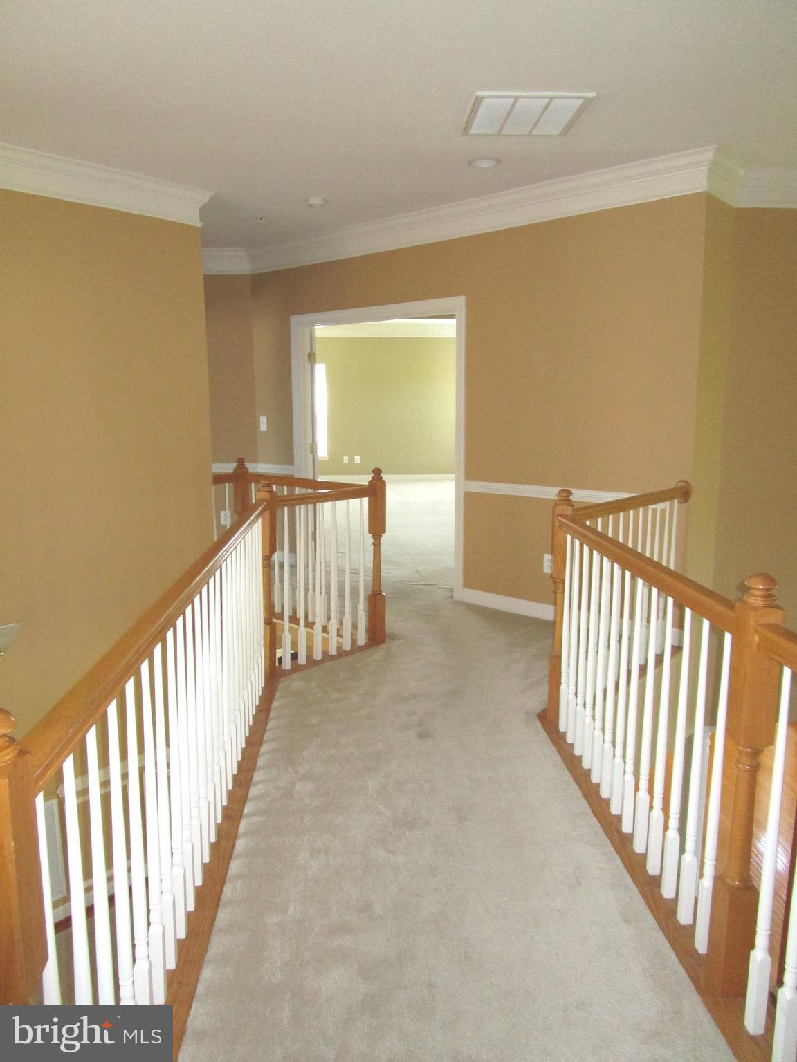 14204 Derby Ridge Road Bowie, MD 20721 - Photo 14 of 27 a view of staircase with rug floor