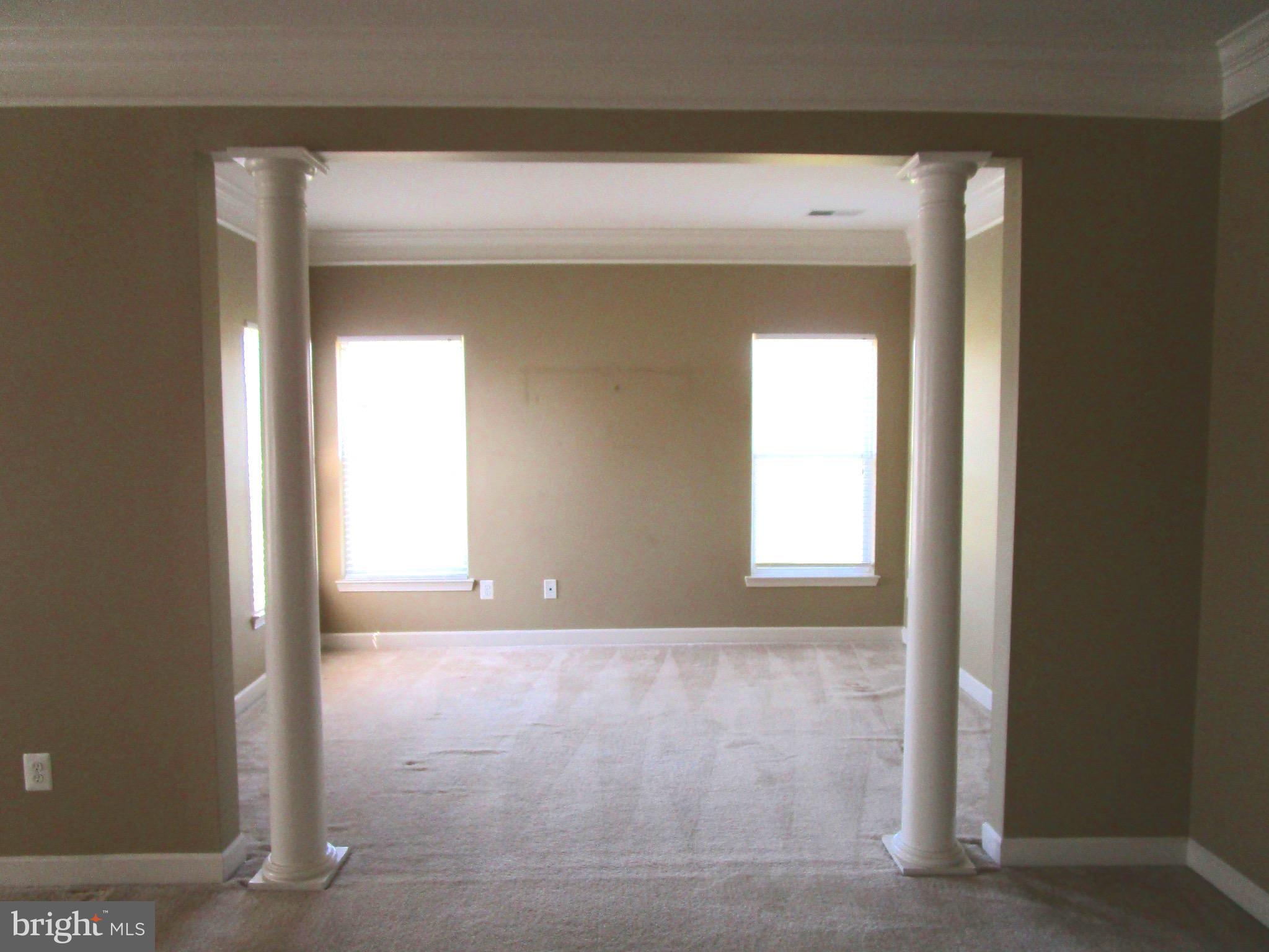 14204 Derby Ridge Road Bowie, MD 20721 - Photo 15 of 27 a view of an empty room with a window